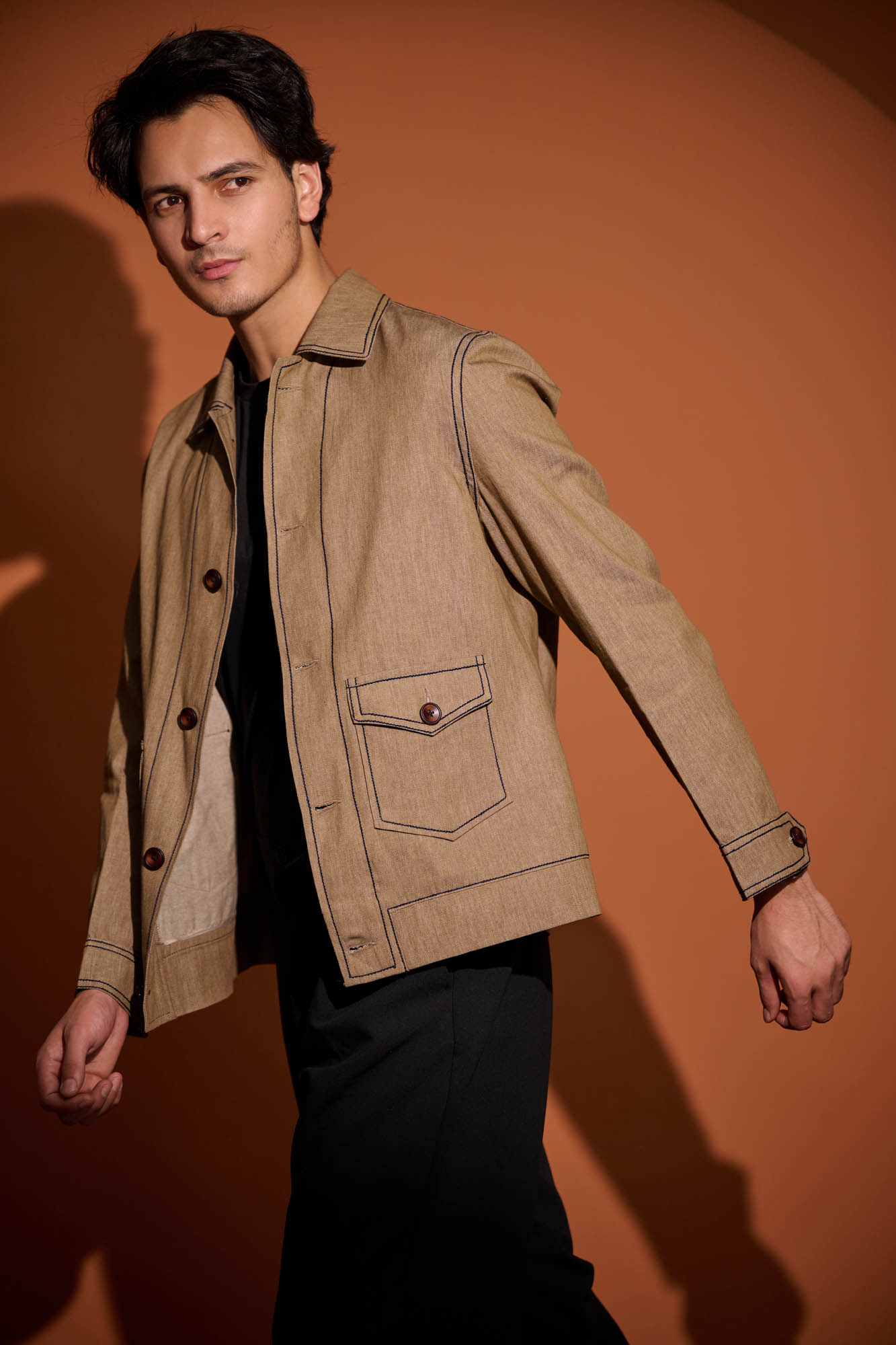 Male Model Poses for a Photoshoot